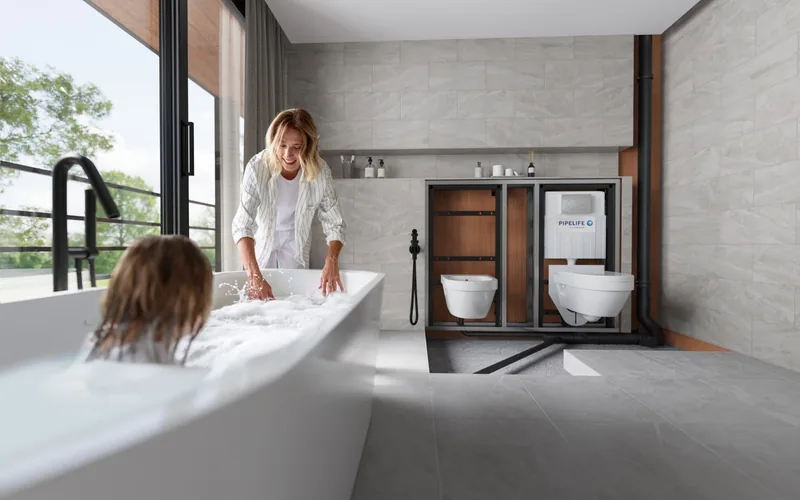 Pipelife pre-wall plumbing system installed in a modern bathroom