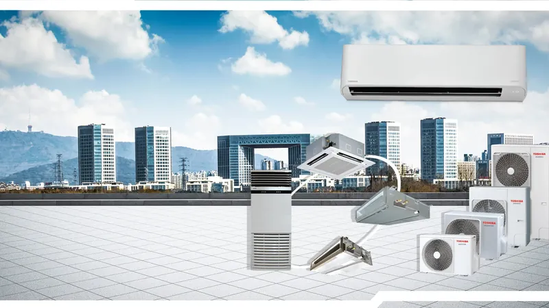 Toshiba air-conditioning outdoor units and an indoor cassette unit on a city rooftop, with an urban skyline behind.
